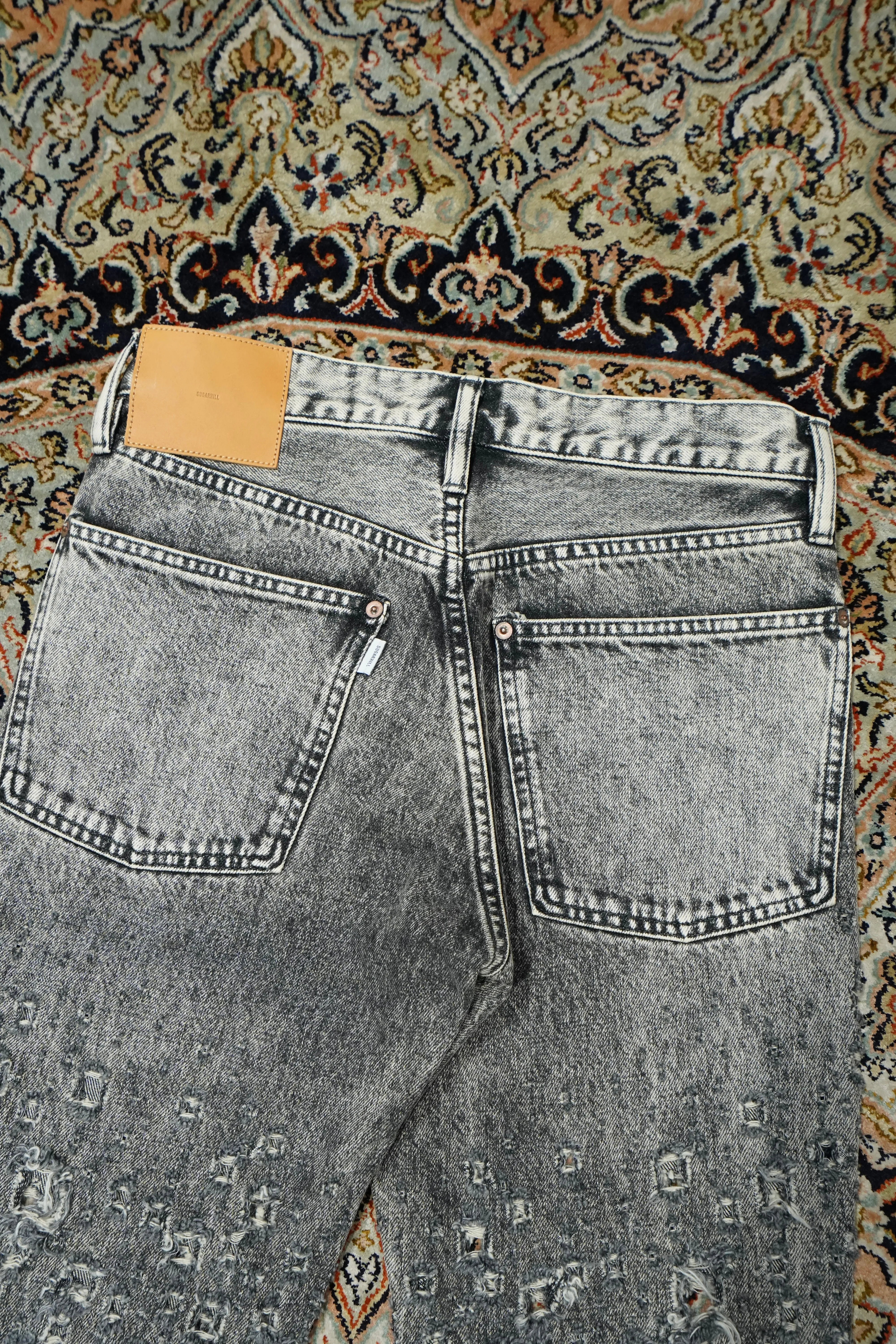 SUGARHILL CRASHED BLACK MODERN DENIM FLARED TROUSERS (FADED BLACK)
